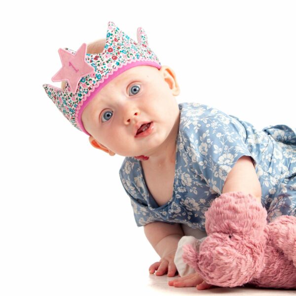 young girl smiling looking at the camera