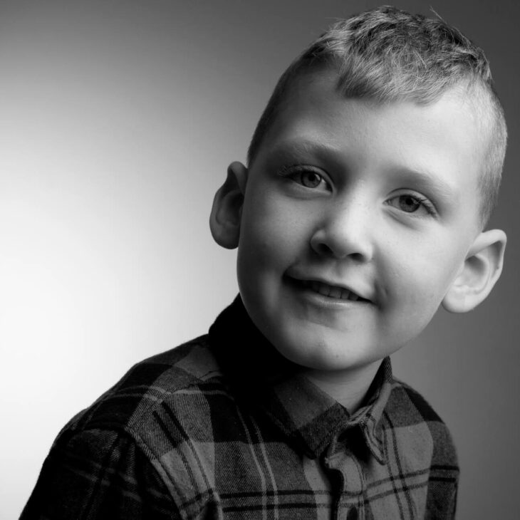 black and white photo of a young boy